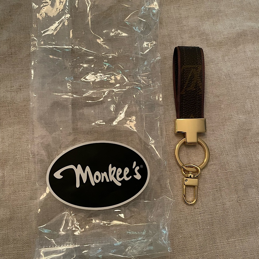 New never used Louis Vuitton key chain